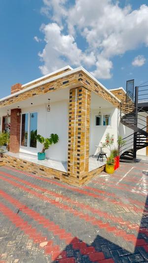 Apartment ya vyumba viwili inauzwa Wazo Msigani, Dar Es Salaam (400 sqm) Apartment ya vyumba viwili inauzwa Wazo Msigani, Dar Es Salaam (400 sqm)
