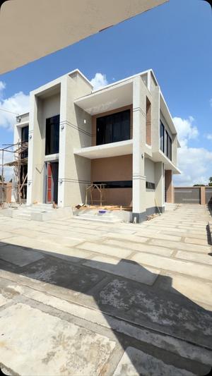 Nyumba ya vyumba vinne inauzwa Kigamboni Mbuga, Dar Es Salaam (400 sqm) Nyumba ya vyumba vinne inauzwa Kigamboni Mbuga, Dar Es Salaam (400 sqm)
