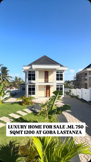 Nyumba ya vyumba vinne inauzwa Goba Center, Dar Es Salaam (1200 sqm) Nyumba ya vyumba vinne inauzwa Goba Center, Dar Es Salaam (1200 sqm)