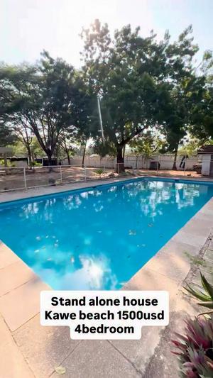 Nyumba (Furnished) ya vyumba vinne inapangishwa Kawe Beach, Dar Es Salaam Nyumba (Furnished) ya vyumba vinne inapangishwa Kawe Beach, Dar Es Salaam