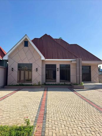 Nyumba ya vyumba vinne inauzwa Boko Bulumawe, Dar Es Salaam (700 sqm)